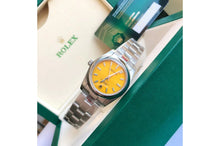 Rolex Oyster Perpetual 31/41mm SS/SS Yellow/Stk