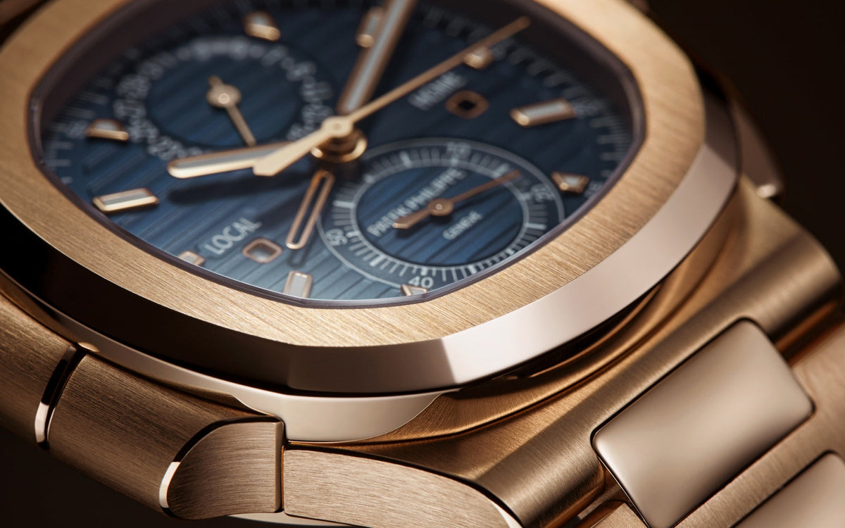 Patek Philippe Nautilus Travel Time Chronograph , 18k Roségold, 40,5 mm