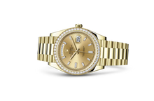 Rolex Day-Date Gelbgold Diamanten Bezel Champagne Diamanten Dial