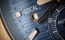 Patek Philippe Nautilus Travel Time Chronograph , 18k Roségold, 40,5 mm