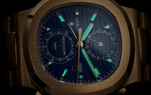 Patek Philippe Nautilus Travel Time Chronograph , 18k Roségold, 40,5 mm