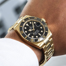Rolex Perpetual Submariner Date 41mm Schwarzes Zifferblatt Gelbgold